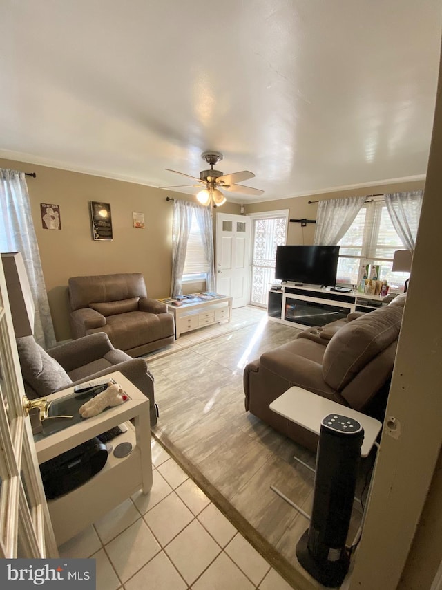 5412 Daywalt Ave, Baltimore, MD 21206 - living area with light tile patterned flooring and ceiling fan