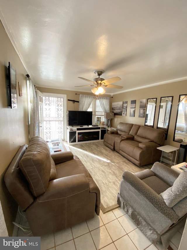 5412 Daywalt Ave, Baltimore, MD 21206 - living room featuring light tile patterned floors, a ceiling fan, and crown molding