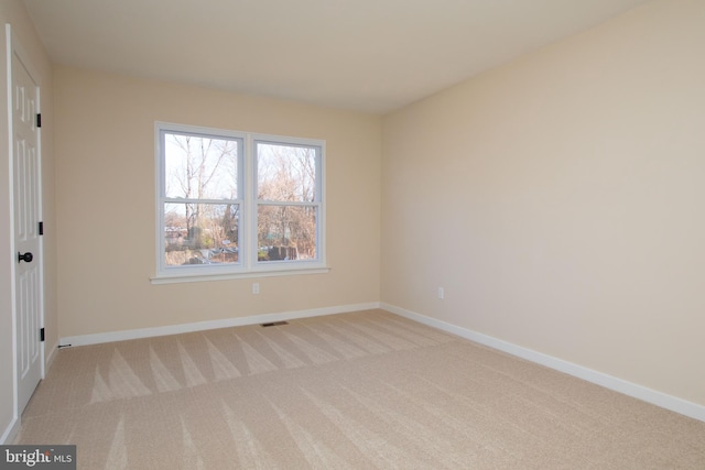 view of carpeted spare room