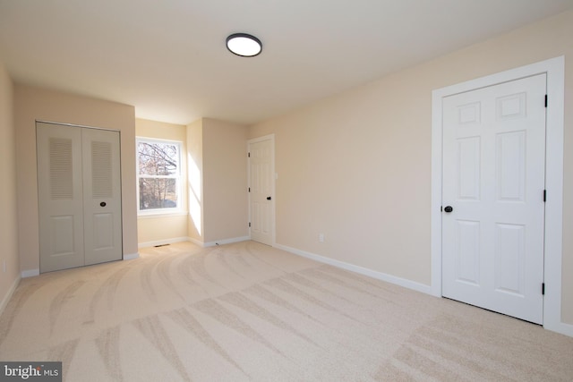 bedroom with light carpet