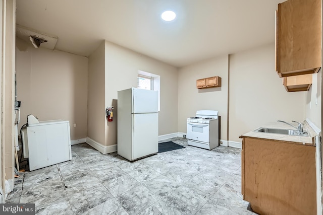 kitchen with white appliances and sink