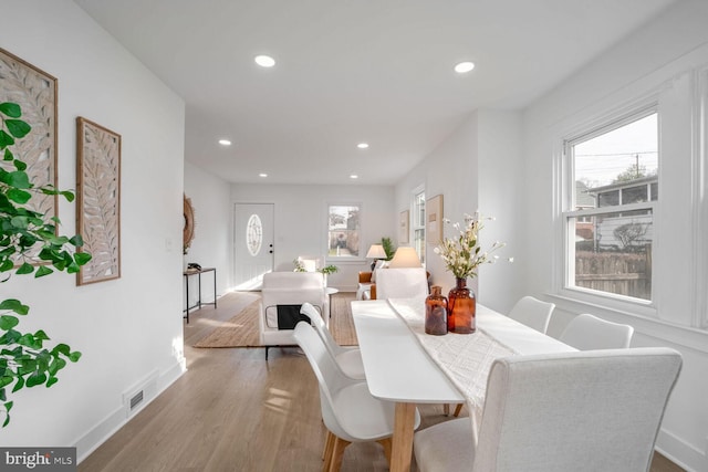 dining area featuring hardwood / wood-style flooring