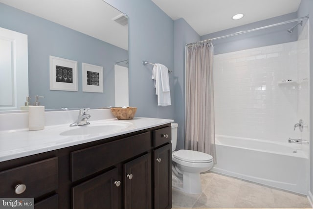 full bathroom with tile patterned floors, vanity, shower / bath combo, and toilet