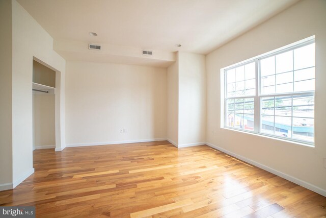 unfurnished bedroom with light hardwood / wood-style flooring