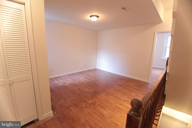 empty room featuring hardwood / wood-style floors