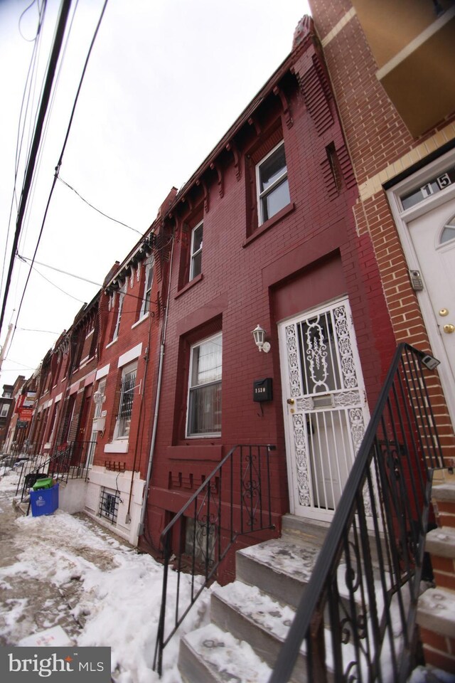 view of snow covered building