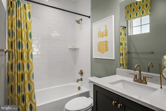 full bathroom featuring shower / tub combo with curtain, vanity, and toilet