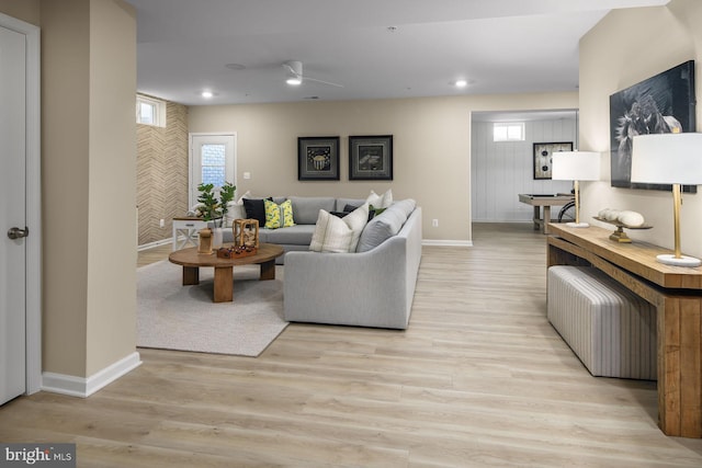 living room featuring light hardwood / wood-style floors and pool table