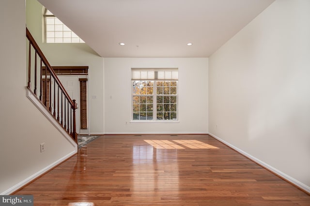 empty room featuring hardwood / wood-style floors