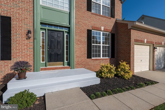 property entrance with a garage