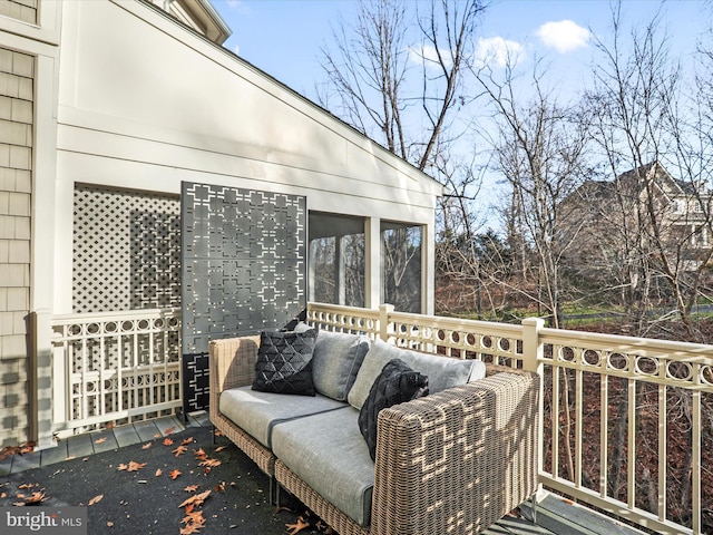 wooden terrace featuring a sunroom