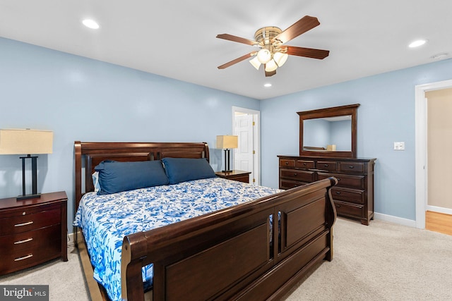 bedroom with light colored carpet and ceiling fan