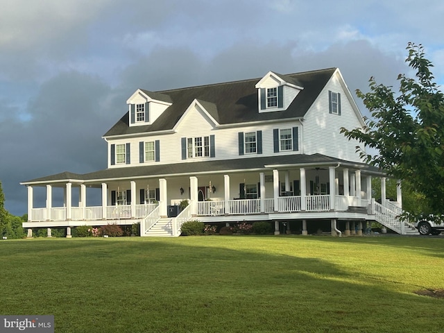 view of front of house with a porch and a front lawn