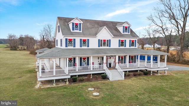 country-style home with a front lawn and a porch