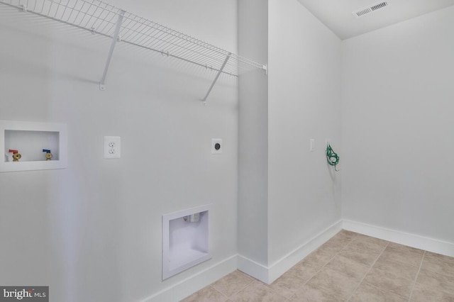 washroom with washer hookup, visible vents, hookup for an electric dryer, laundry area, and baseboards