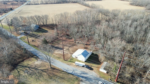 birds eye view of property featuring a rural view