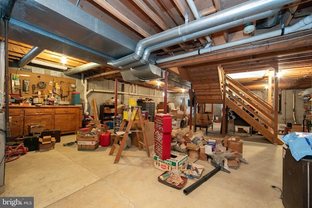 basement with a workshop area