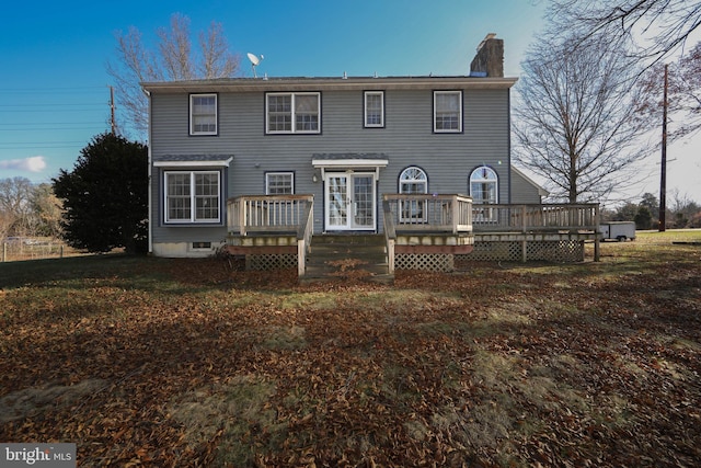 view of front of property featuring a wooden deck