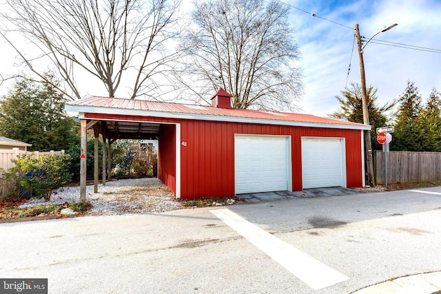 garage with a carport