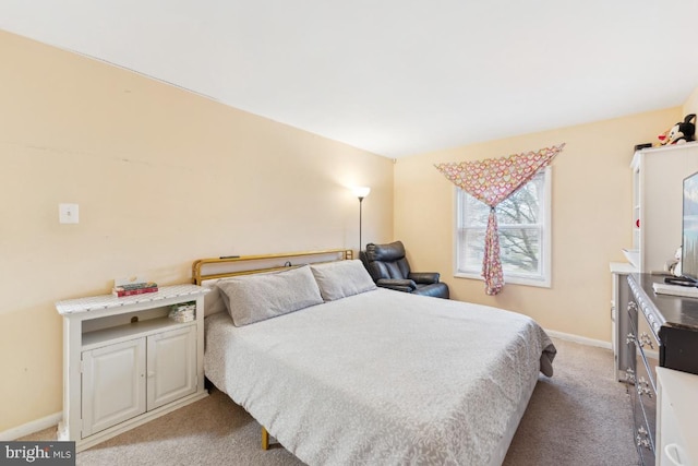 bedroom with light carpet