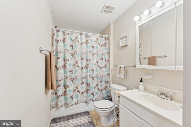 full bathroom with tile patterned flooring, vanity, shower / tub combo with curtain, and toilet