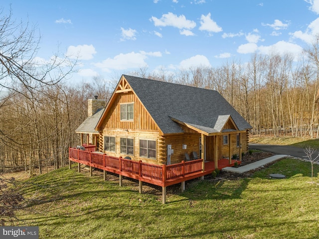 68 Sundance Way, Mc Henry, MD 21541 - rear view of house featuring log siding, a lawn, a chimney, and a shingled roof