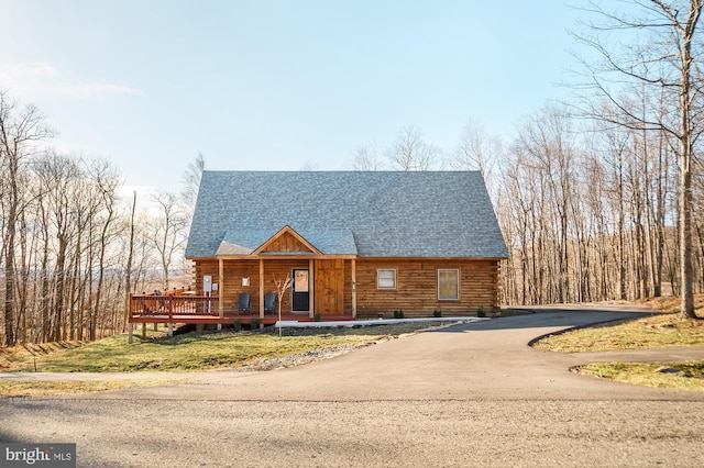 view of log cabin