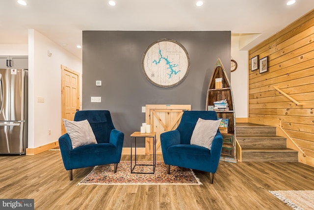 sitting room with hardwood / wood-style floors