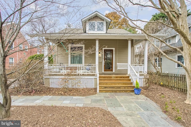 bungalow-style home with covered porch