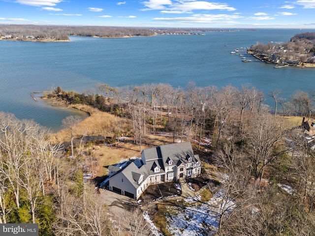 birds eye view of property featuring a water view