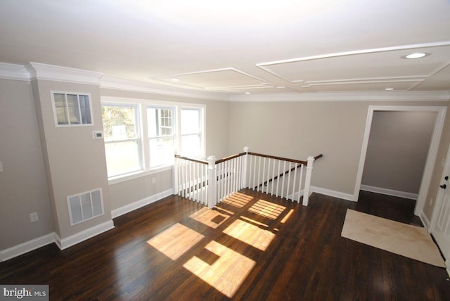 stairs featuring hardwood / wood-style floors and ornamental molding