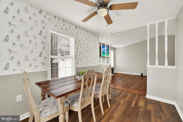 dining room with ceiling fan and dark wood-type flooring