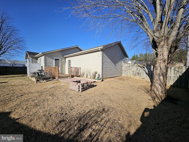 rear view of house with a deck