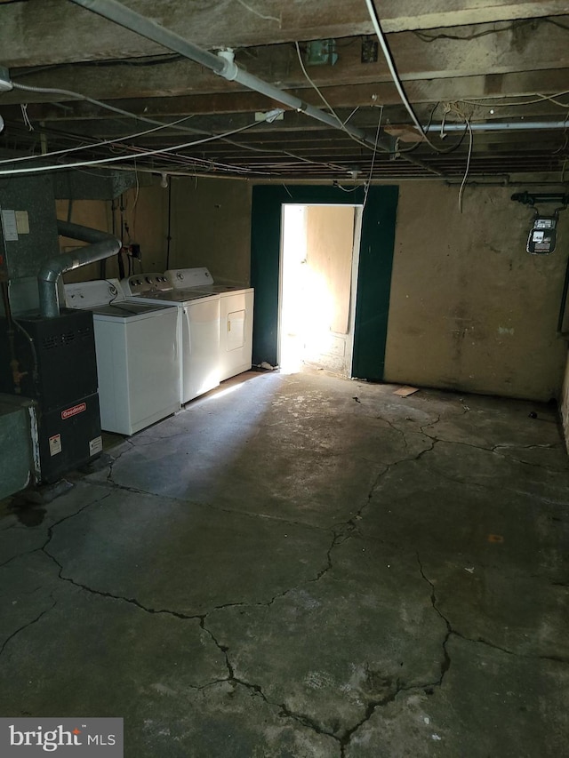 basement featuring washing machine and dryer