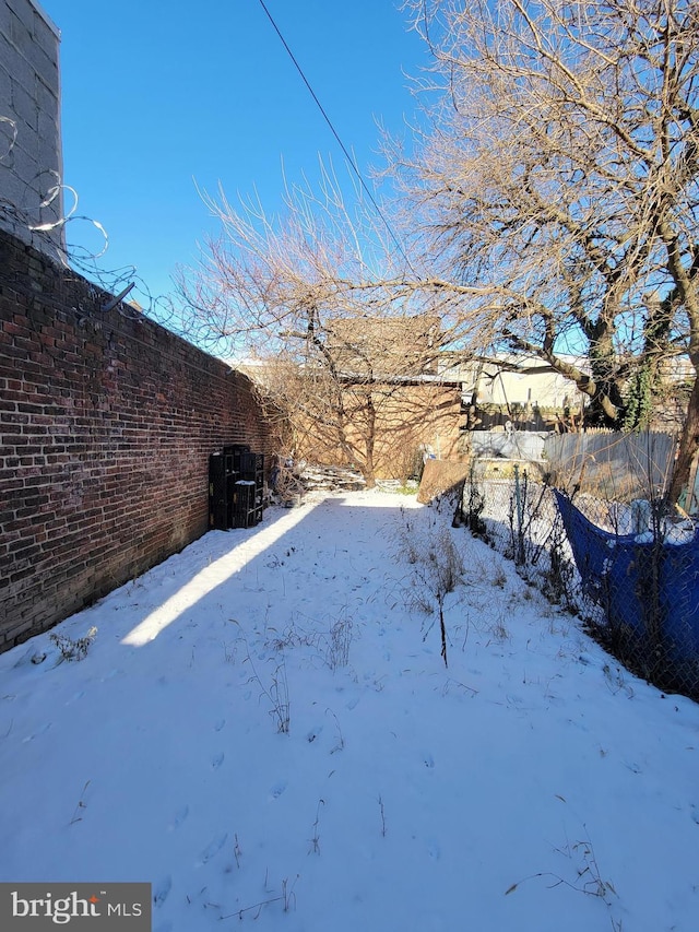 view of snowy yard