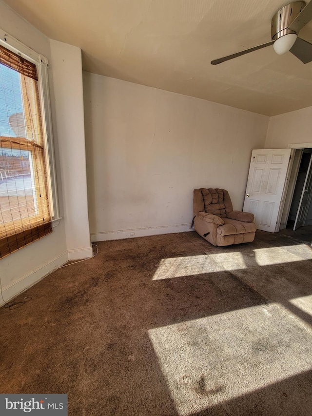 unfurnished room featuring carpet flooring and ceiling fan