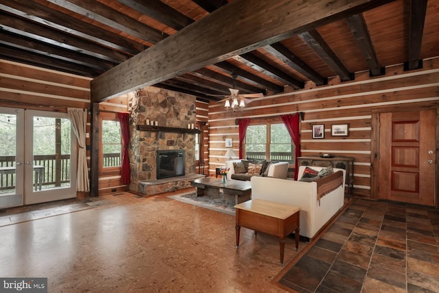 living room with beam ceiling, french doors, a stone fireplace, and wooden walls