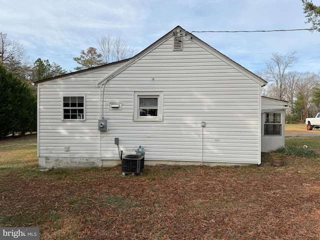 view of home's exterior featuring central AC