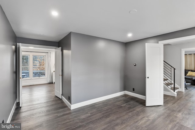 hall featuring dark wood-type flooring