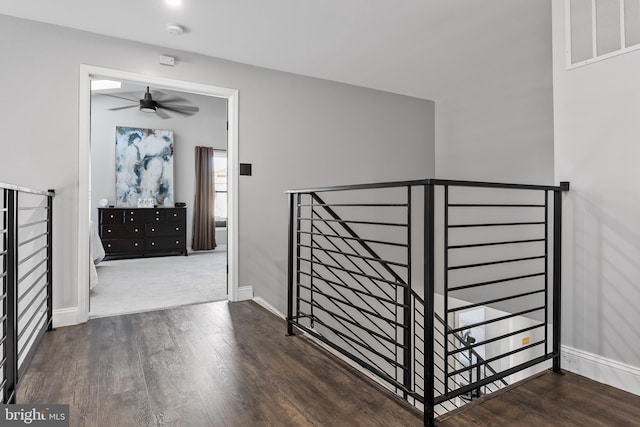 interior space featuring ceiling fan and wood-type flooring