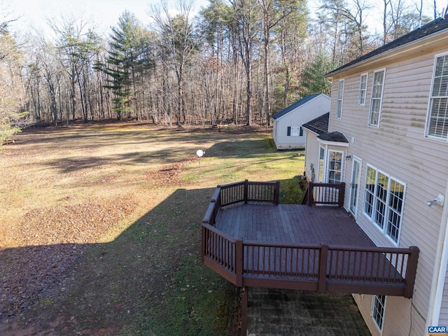 view of yard featuring a deck