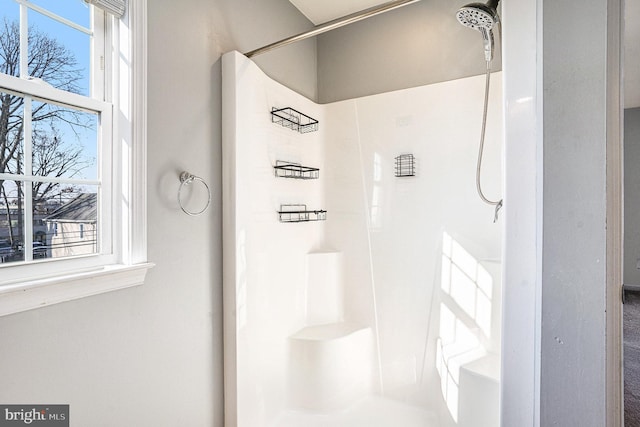 bathroom with walk in shower