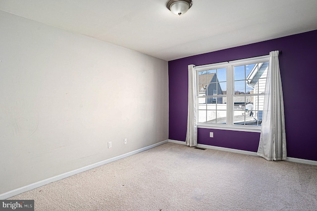 empty room with carpet floors