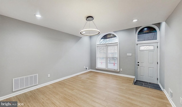 foyer with light hardwood / wood-style flooring