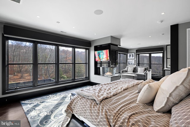 bedroom featuring wood-type flooring