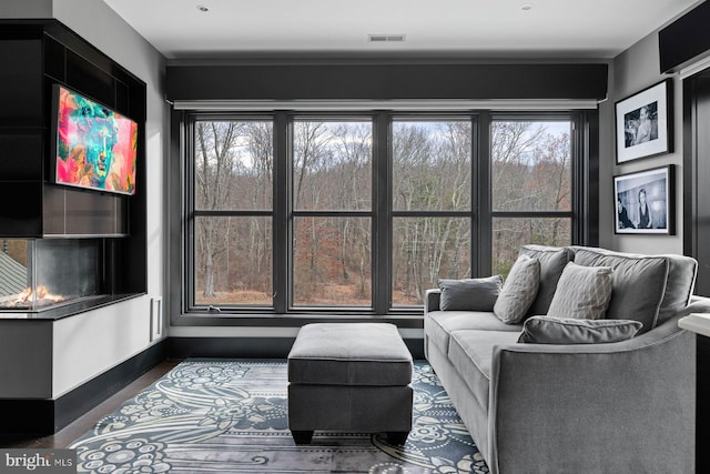 living room with dark wood-type flooring