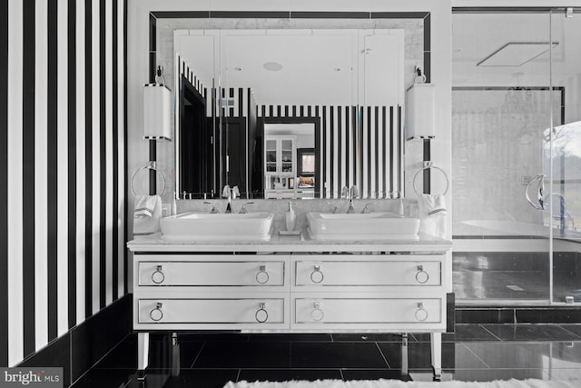 bathroom with vanity, tile patterned floors, and an enclosed shower