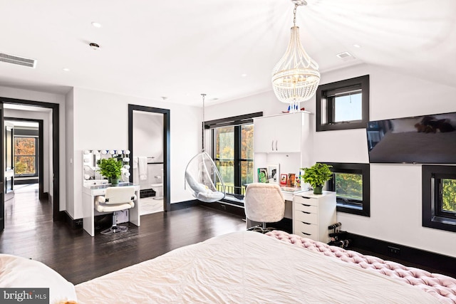 bedroom with lofted ceiling, dark hardwood / wood-style flooring, and a notable chandelier