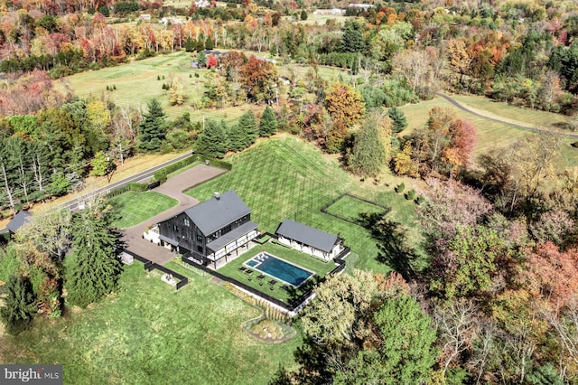 birds eye view of property featuring a rural view