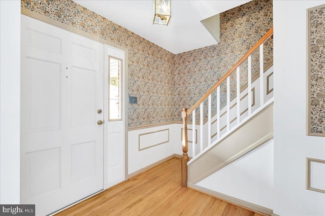 entryway with wood-type flooring